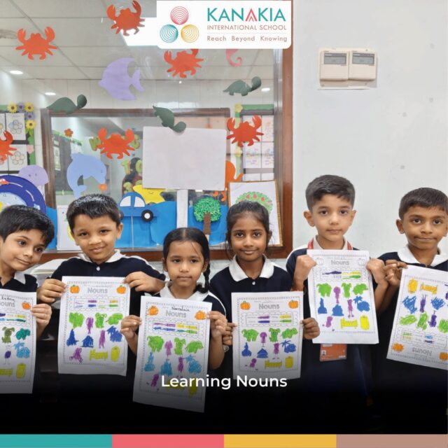 Grade 1 learners colouring naming words in a nouns activity
